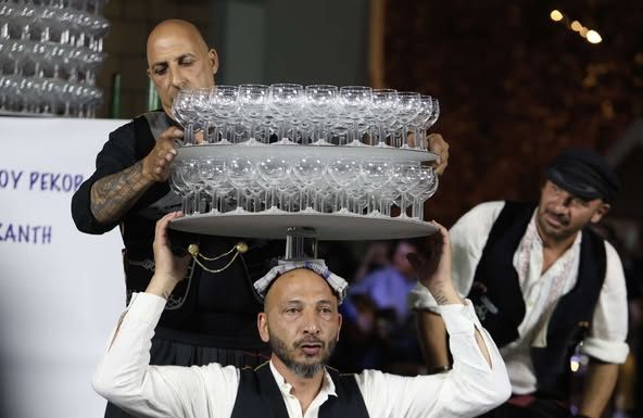 Guinness Record:: Cypriot Dancer Balances With 416 Glasses On His Head